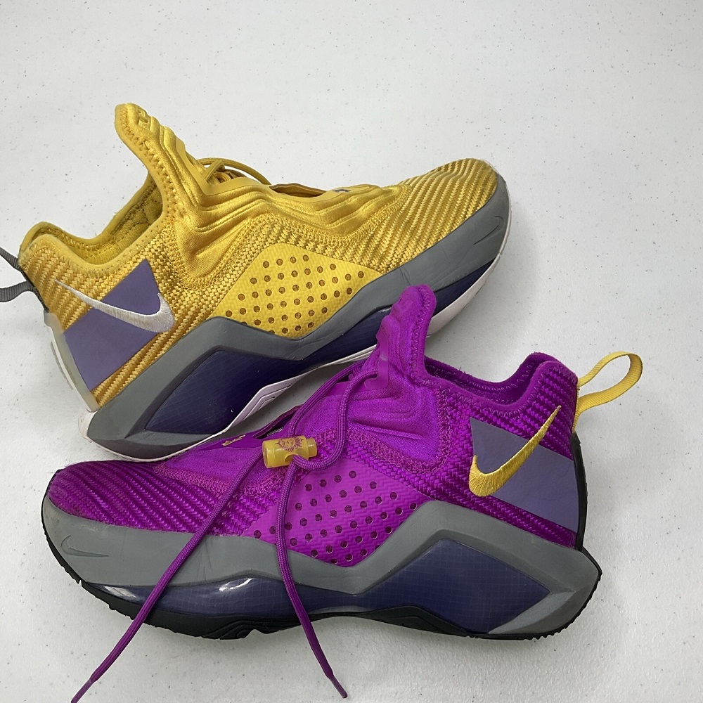 purple and yellow basketball shoes